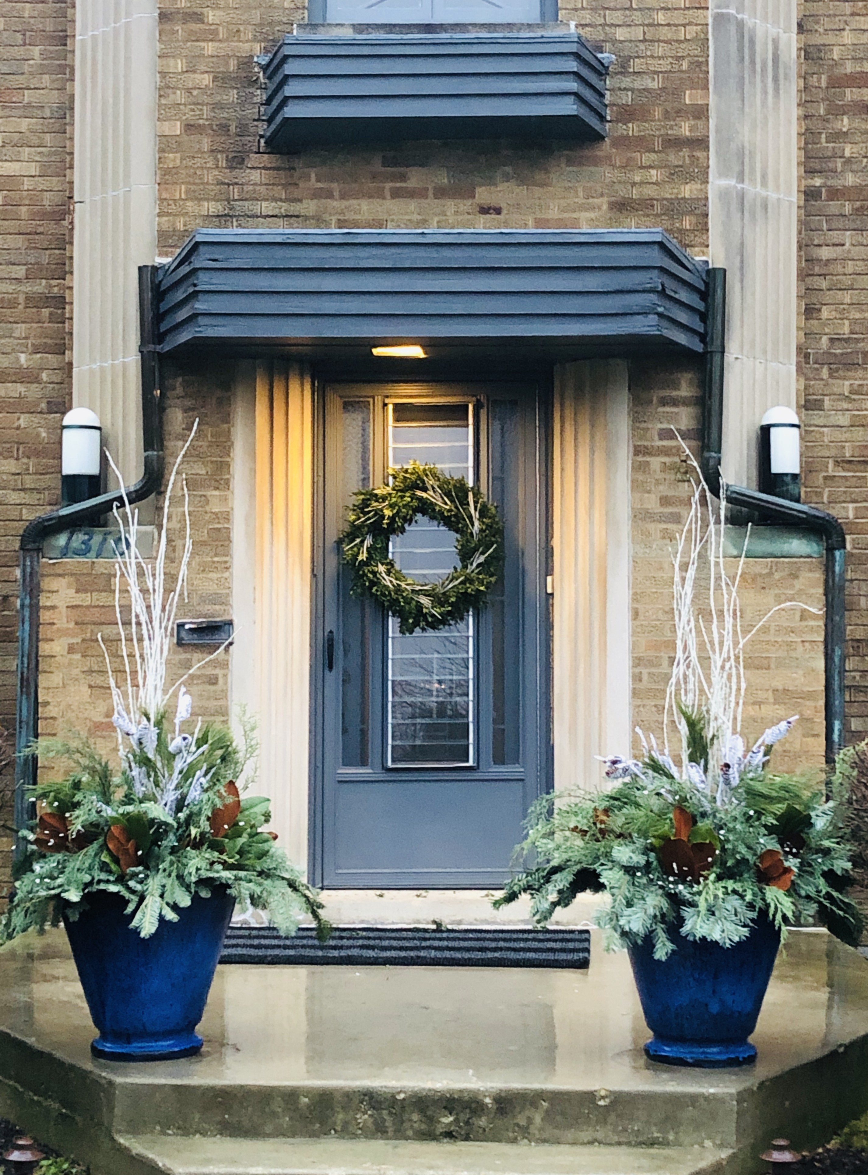 Winter porch planter with evergreens